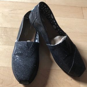 Never worn, Tom’s Black Sparkle Flats. Size W9.
